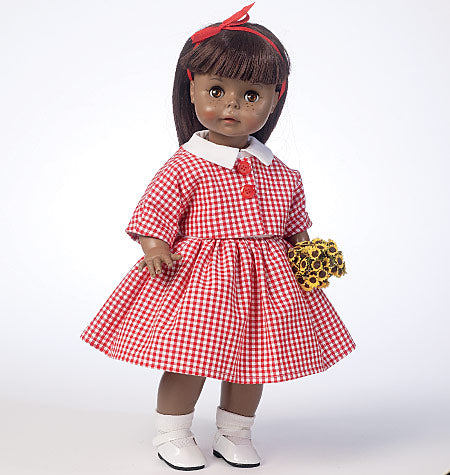 Poupée bringtée de type enfant, robe à motif vichy rouge et blanc, collar blanc, nœud rouge, chaussures blanches, bouquet de tournesols.