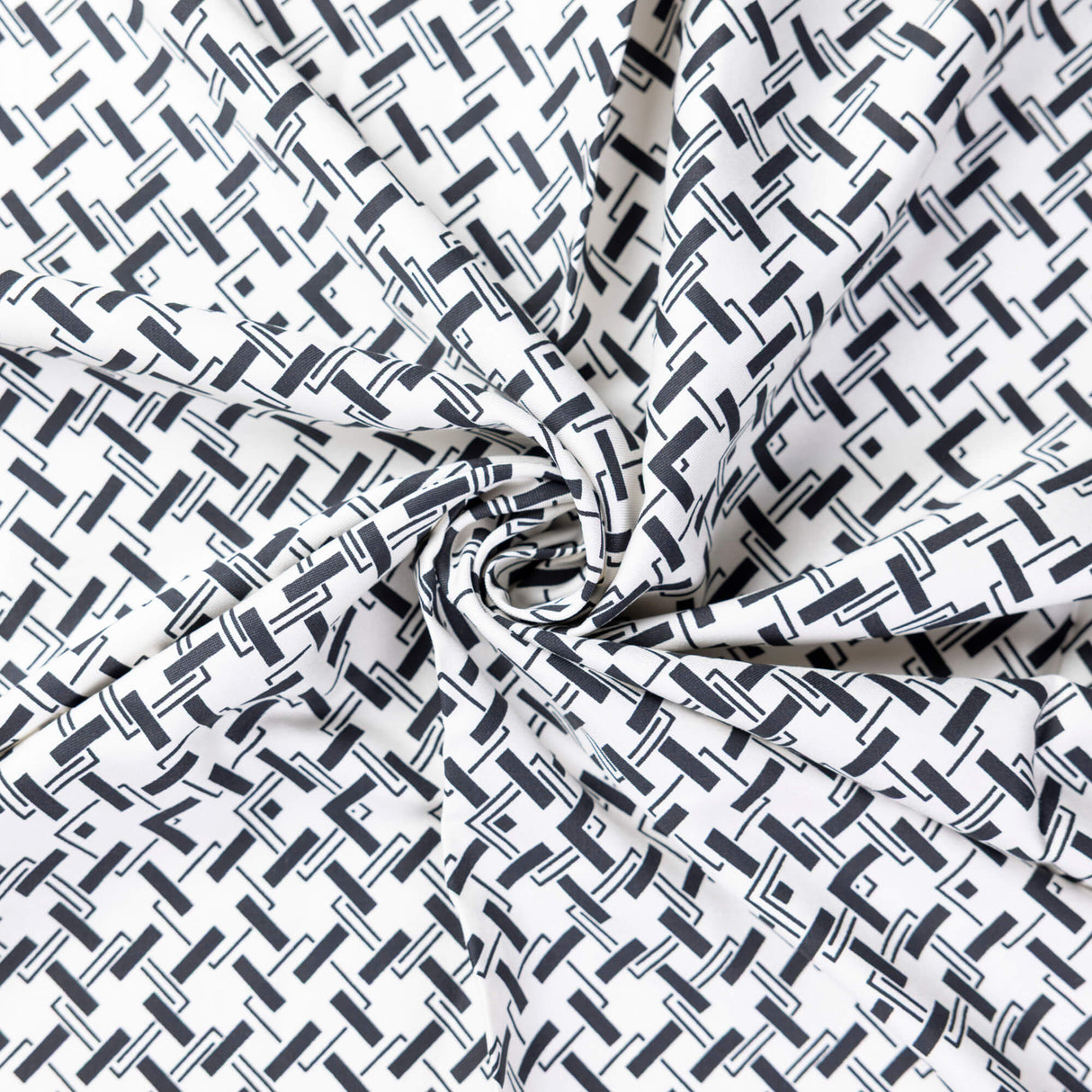 Twill 100% viscose – Motif géométrique noir fond écru