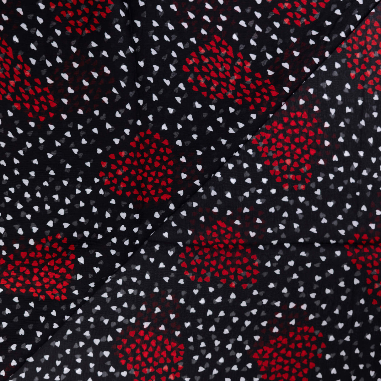 Mousseline crinckle 100% viscose – Cœurs graphiques rouge et blanc fond noir