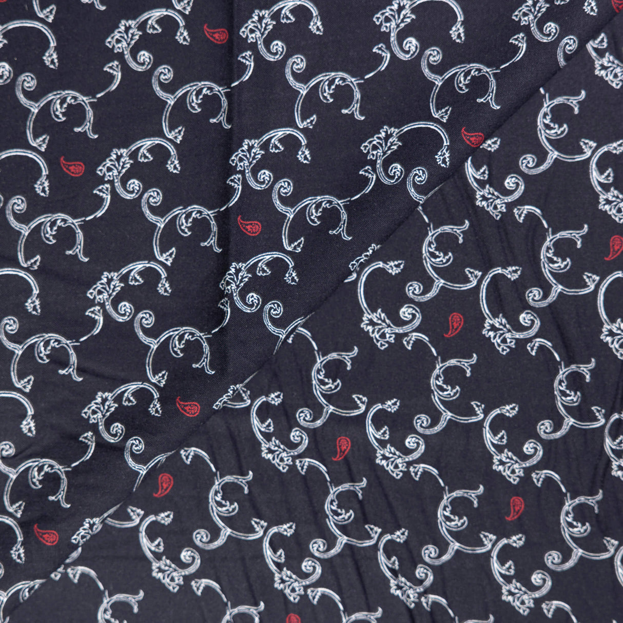 Twill 100% viscose – Arabesques blanches fond noir