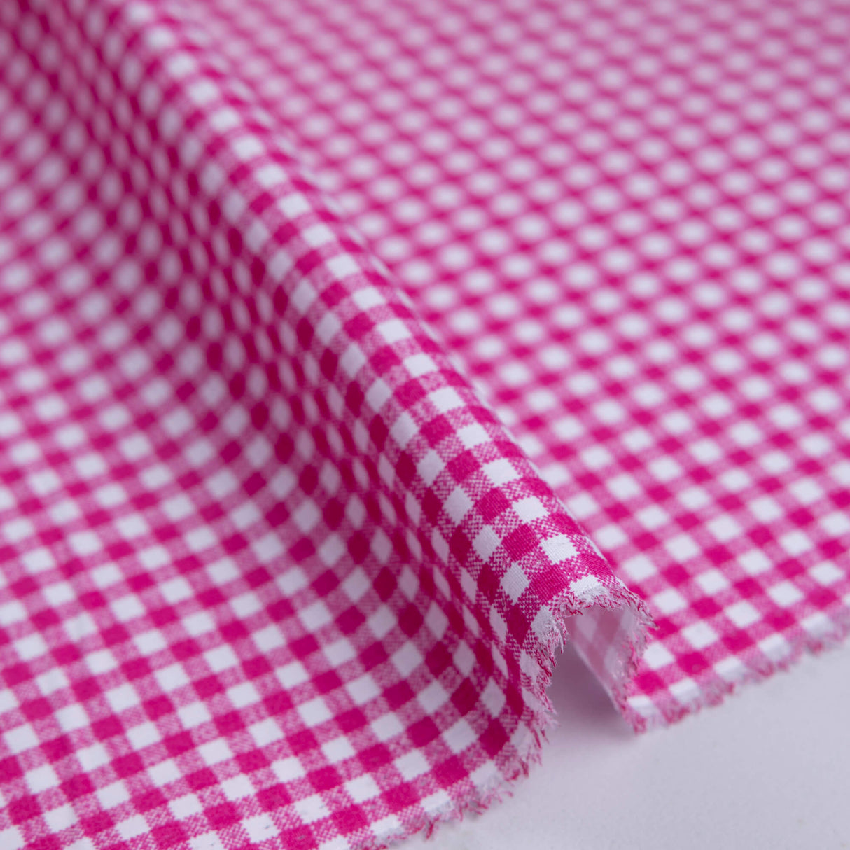 Popeline coton & élasthanne - Vichy rose fuchsia (4mm)