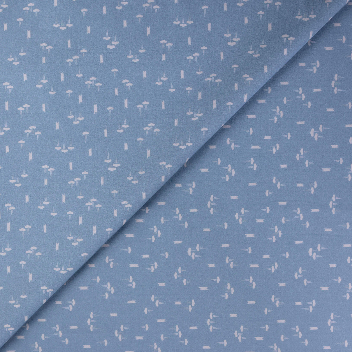 Popeline coton & élasthanne – Motif abstrait blanc fond bleu