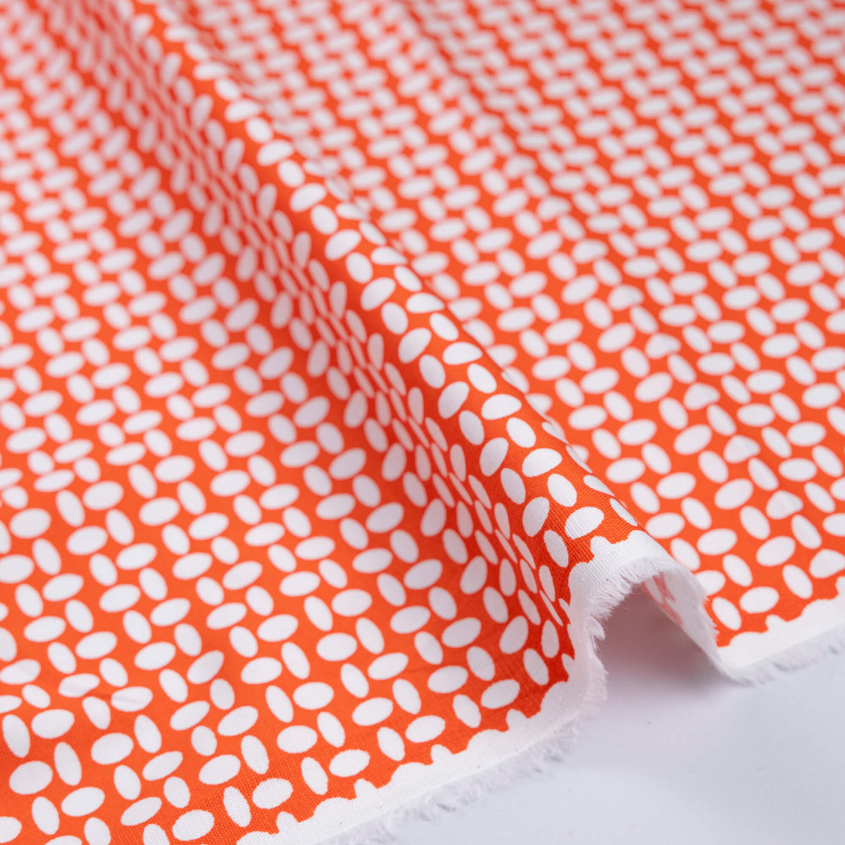 Gabardine coton & élasthanne - Ovales blanc fond orange