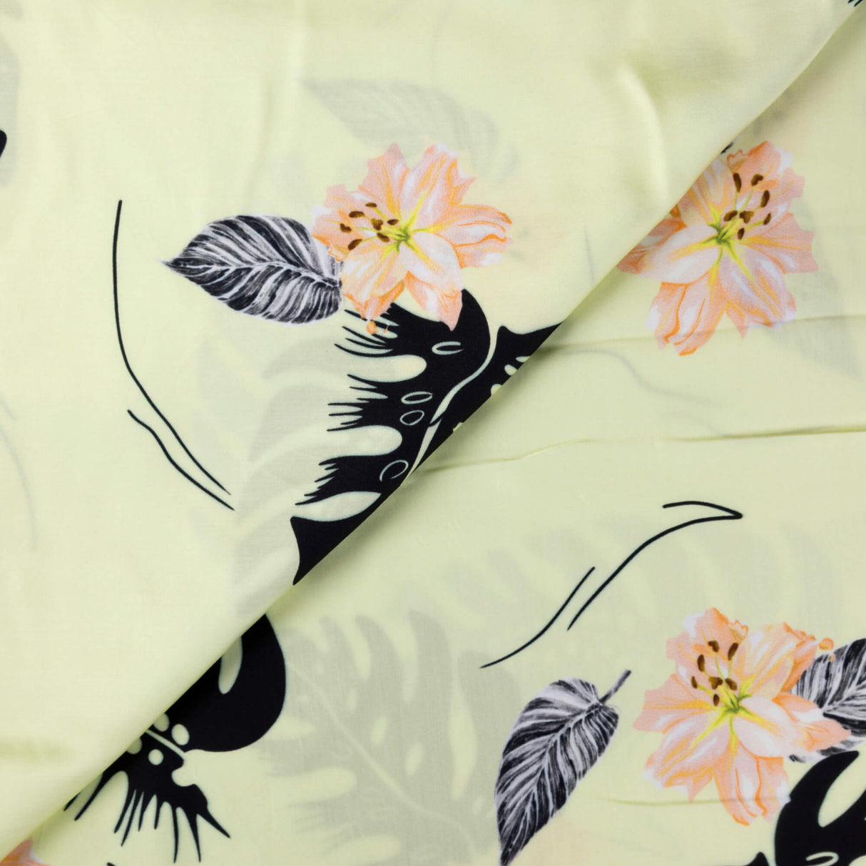 Satin 100% viscose - Feuillage tropical vert pâle