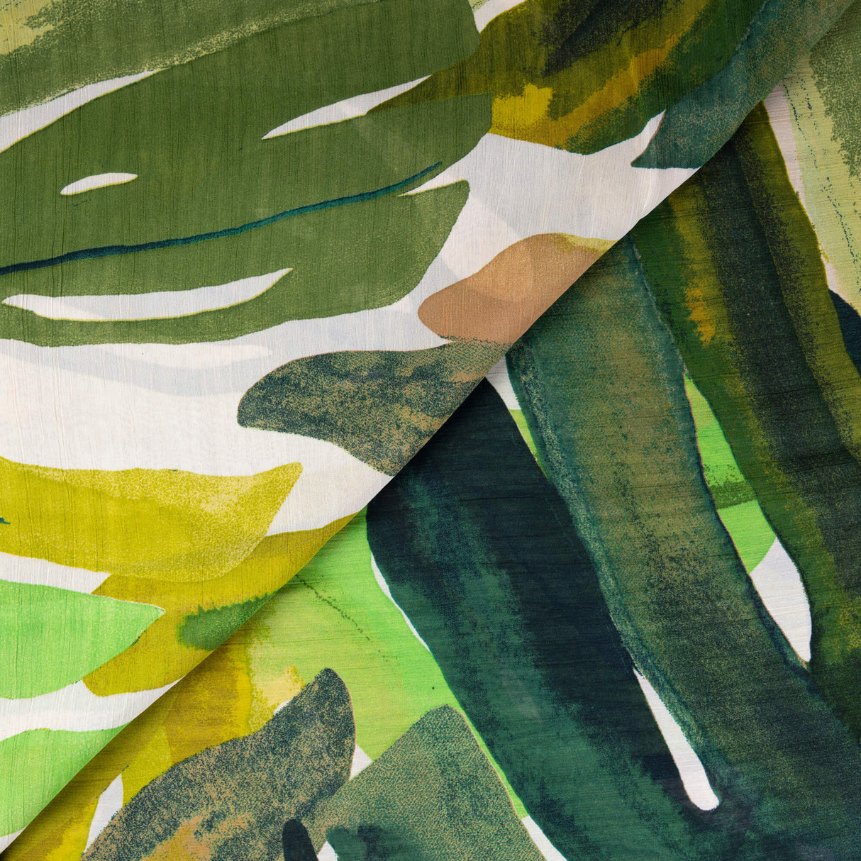 Mousseline froissée 100% viscose – Feuillage tropical vert