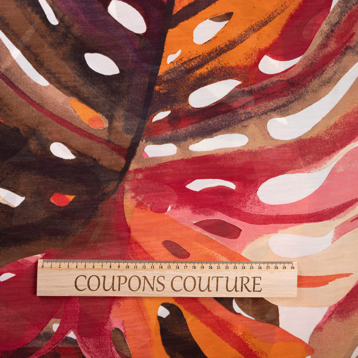Mousseline 100% viscose - Feuillage tropical corail