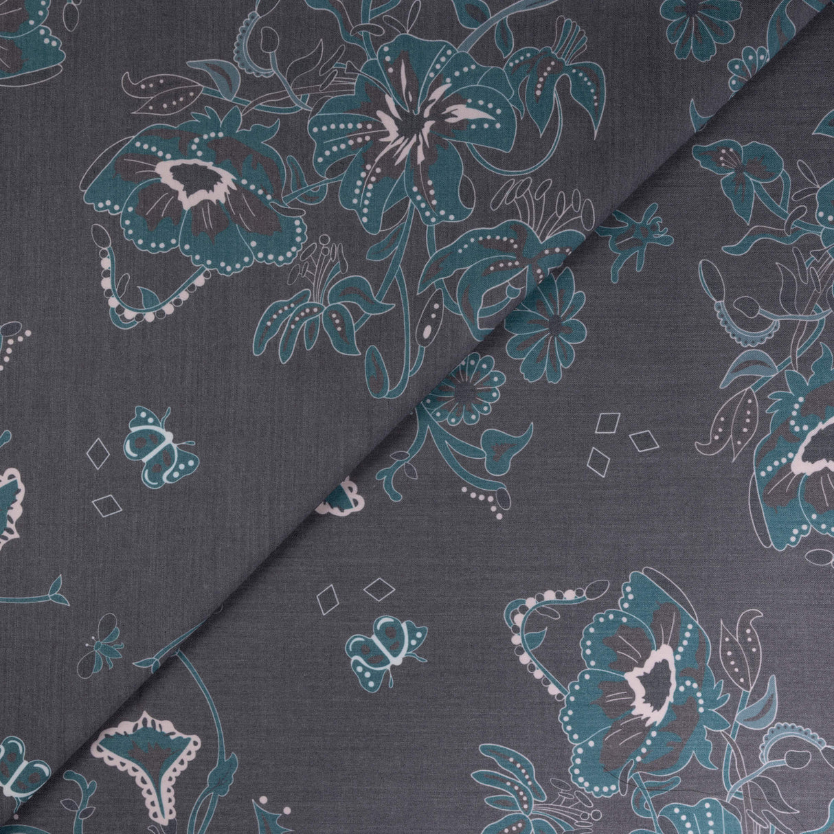 Gabardine de laine extensible - Fleurs et papillons bleu canard