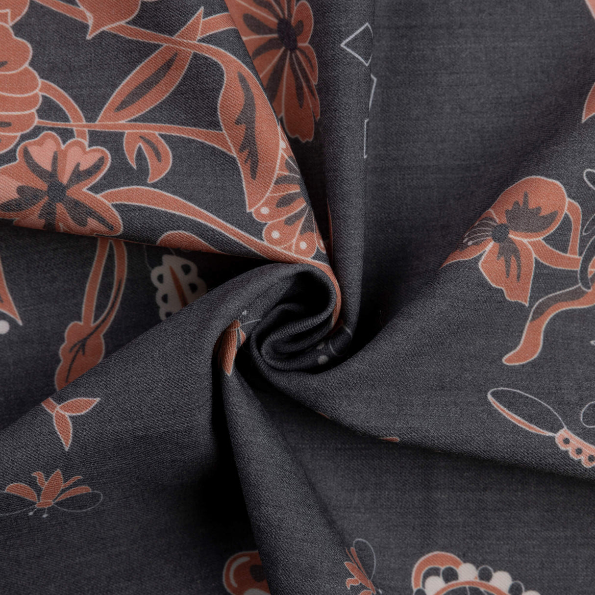 Gabardine de laine extensible - Fleurs terracotta sur fond noir