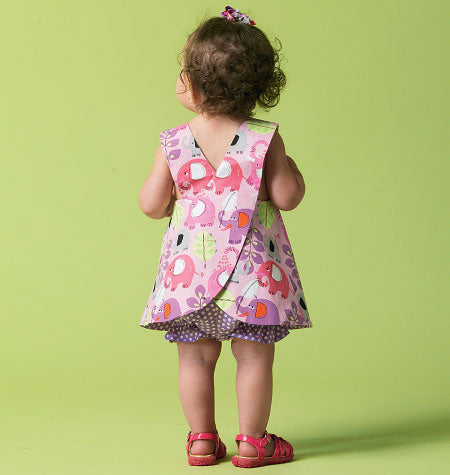 Patron McCall's n°6912 – Haut, robe, culotte bouffante et pantalon pour bébé