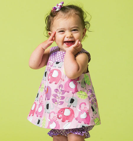 Patron McCall's n°6912 – Haut, robe, culotte bouffante et pantalon pour bébé