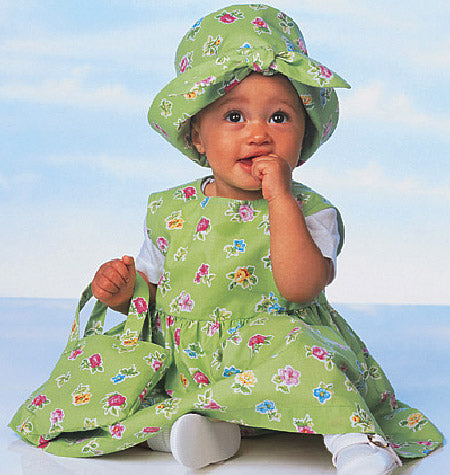 Patron Butterick n°5624 – Ensemble complet pour bébé : robe, chasuble, barboteuse, combinaison, culotte, pantalon, chapeau et sac