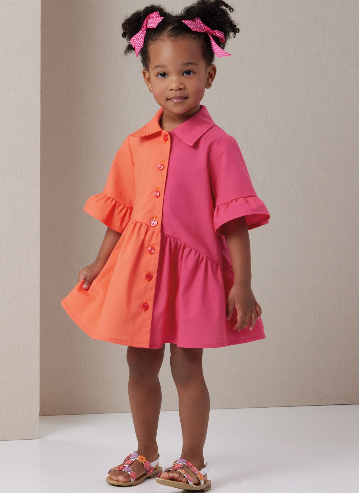 Patron Butterick n°7049 – Robe-tunique bébé à manches