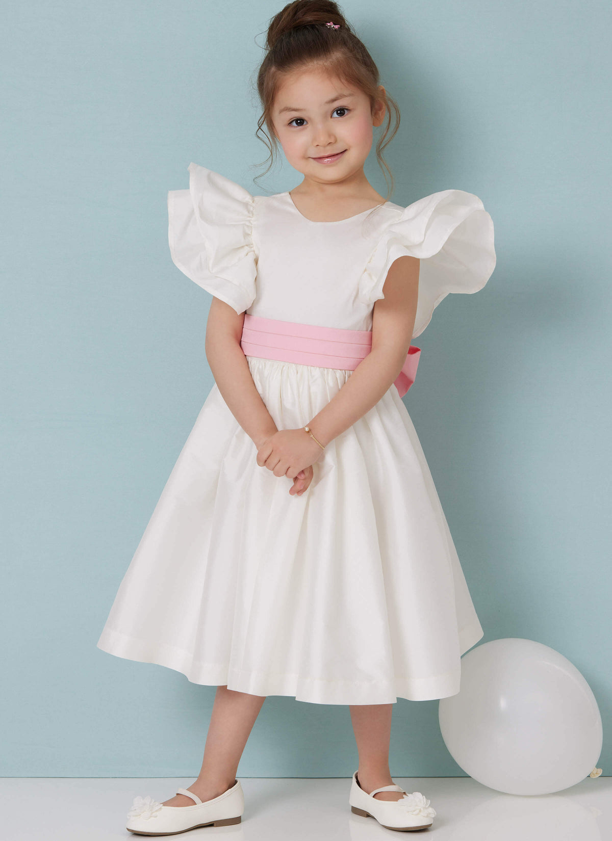 Patron Butterick n°7088 – Robe enfant à volants et nœud dos