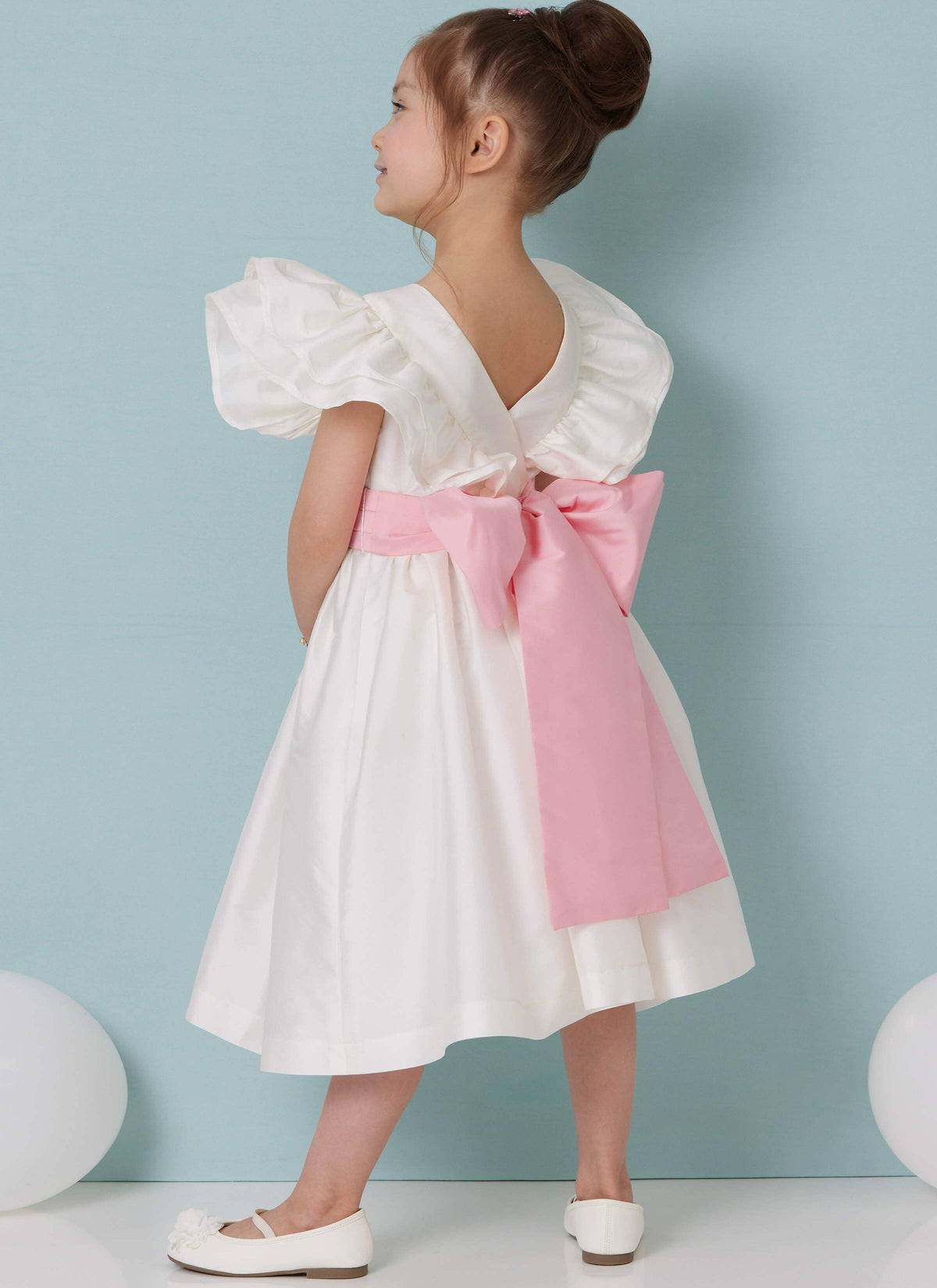 Patron Butterick n°7088 – Robe enfant à volants et nœud dos