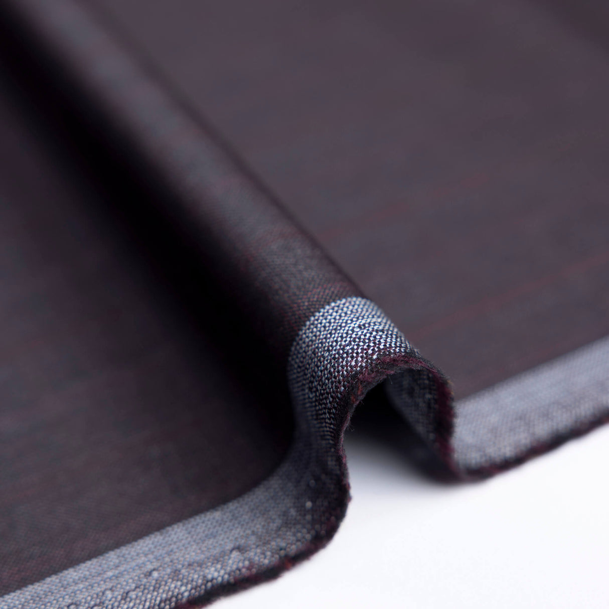 Tissu tailleur 100% laine – Carreaux ton prune