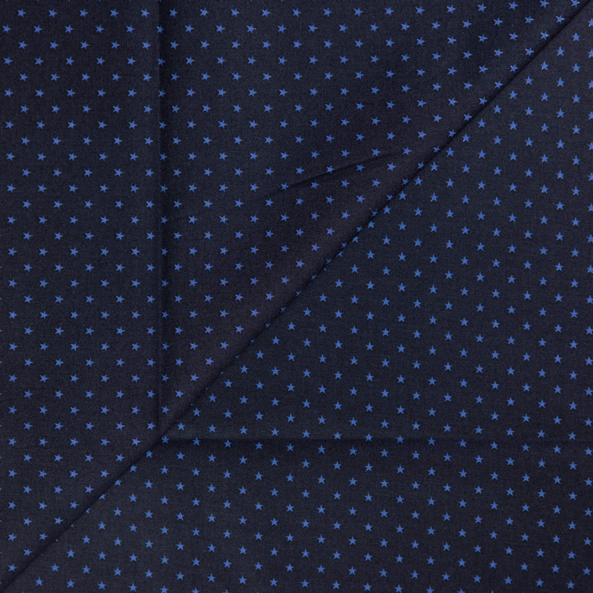 Percale 100% coton – Étoiles bleues sur fond marine