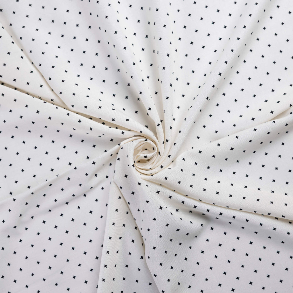 Toile 100% viscose – Étoiles noires sur fond blanc