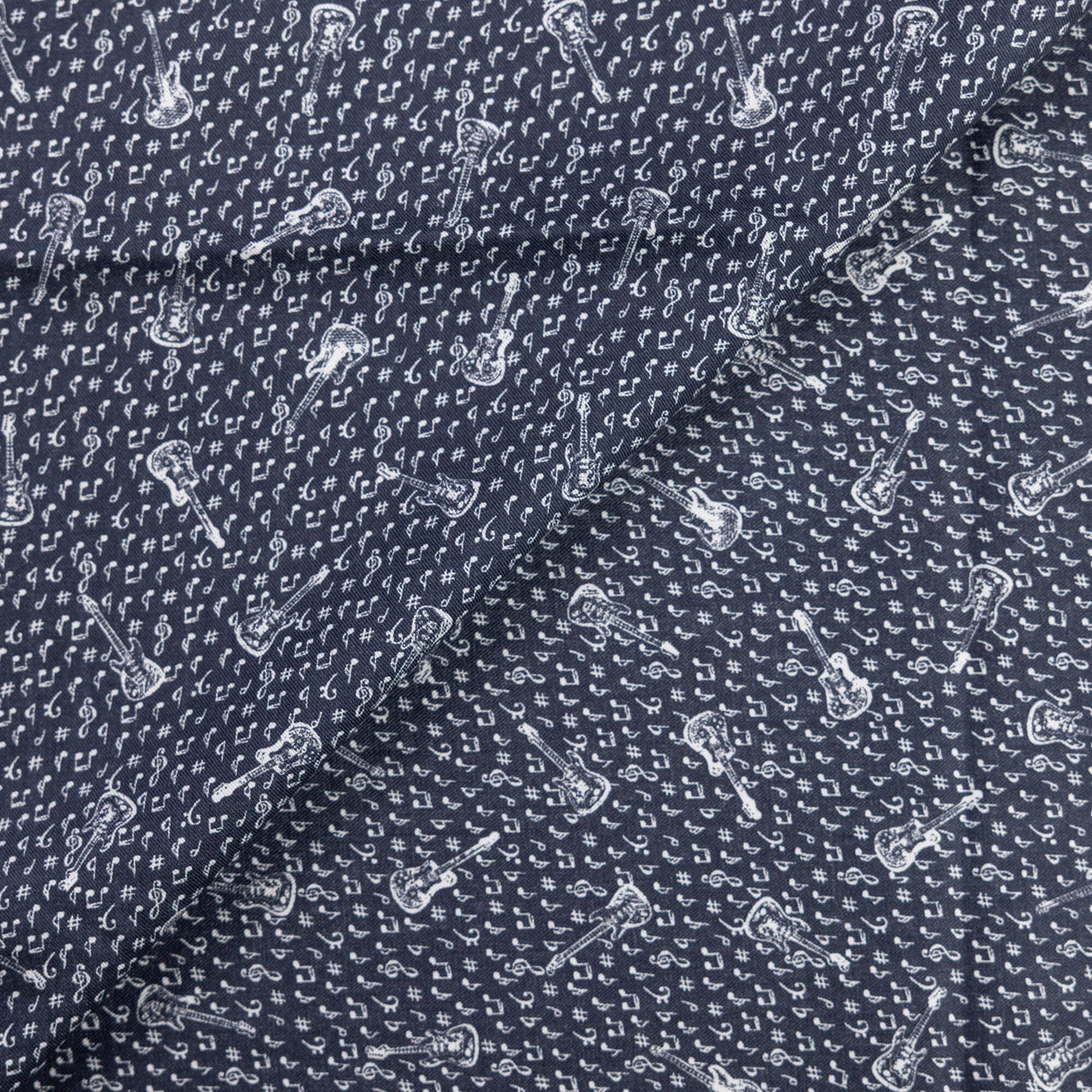 Twill 100% viscose – Motif guitares fond noir