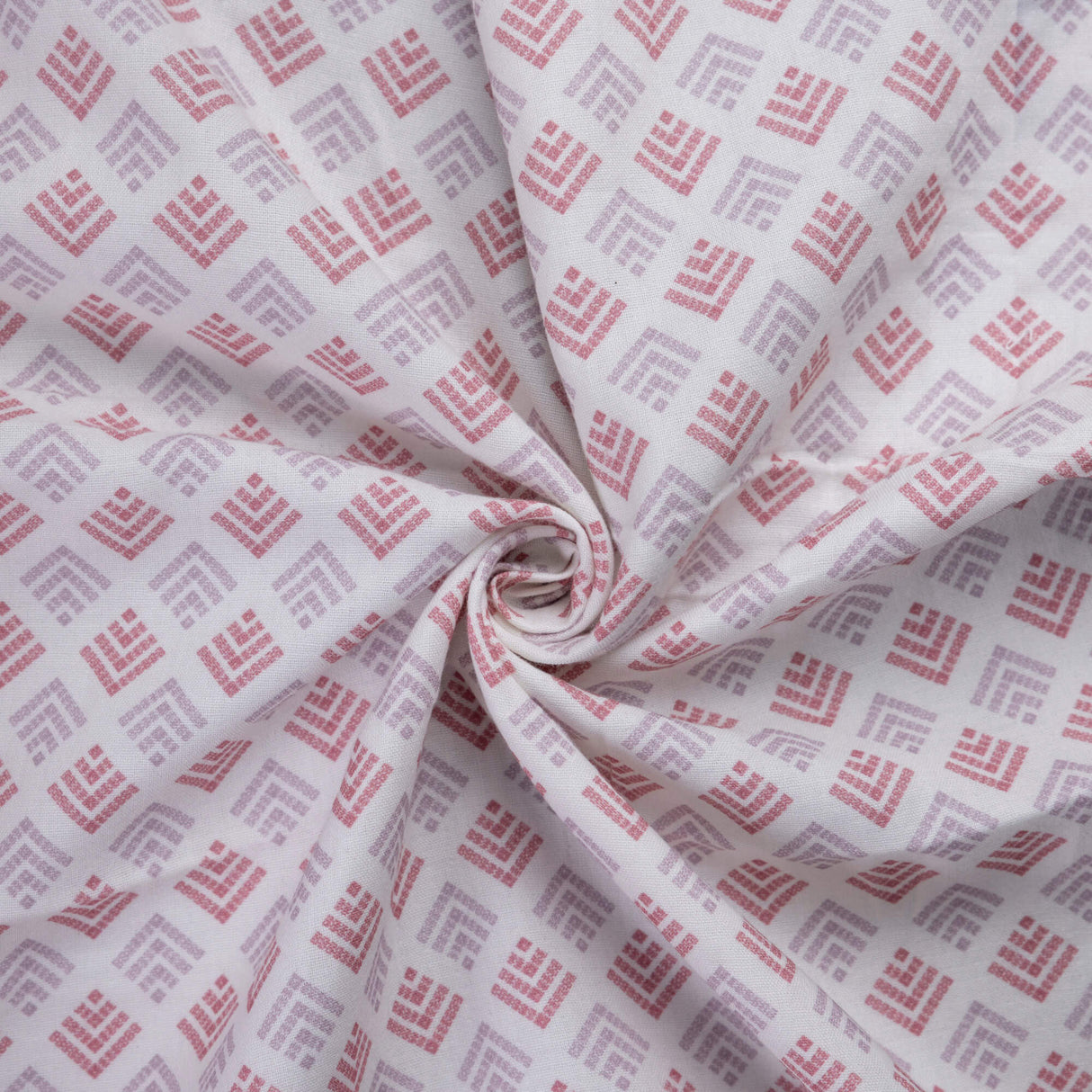 Double gaze 100% coton – Motif géométrique rose et lilas fond blanc