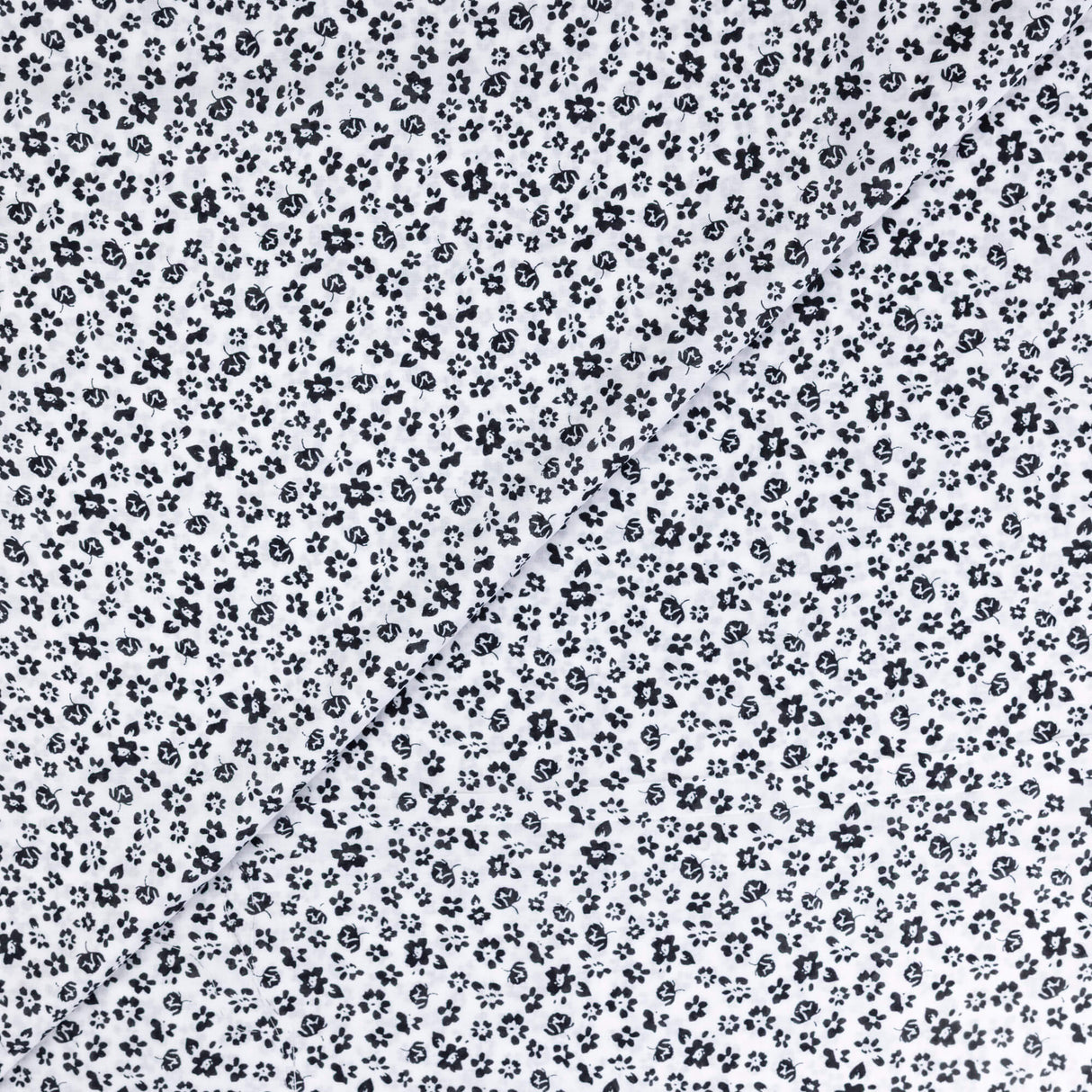 Voile 100% viscose – Fleurs noires fond blanc