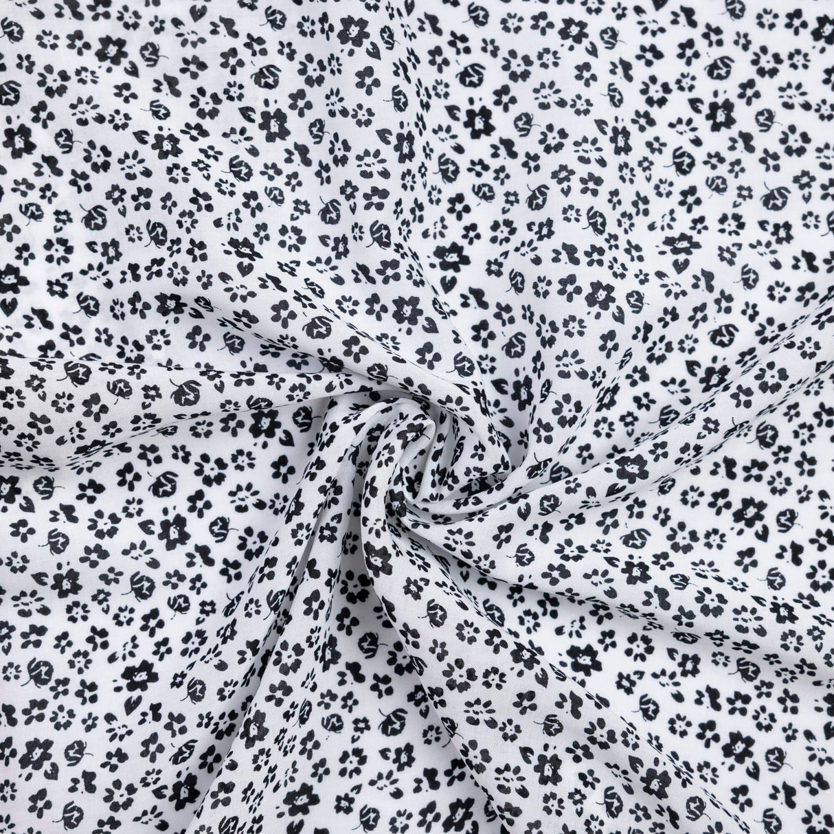 Voile 100% viscose – Fleurs noires fond blanc