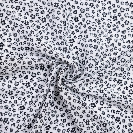 Voile 100% viscose – Fleurs noires fond blanc