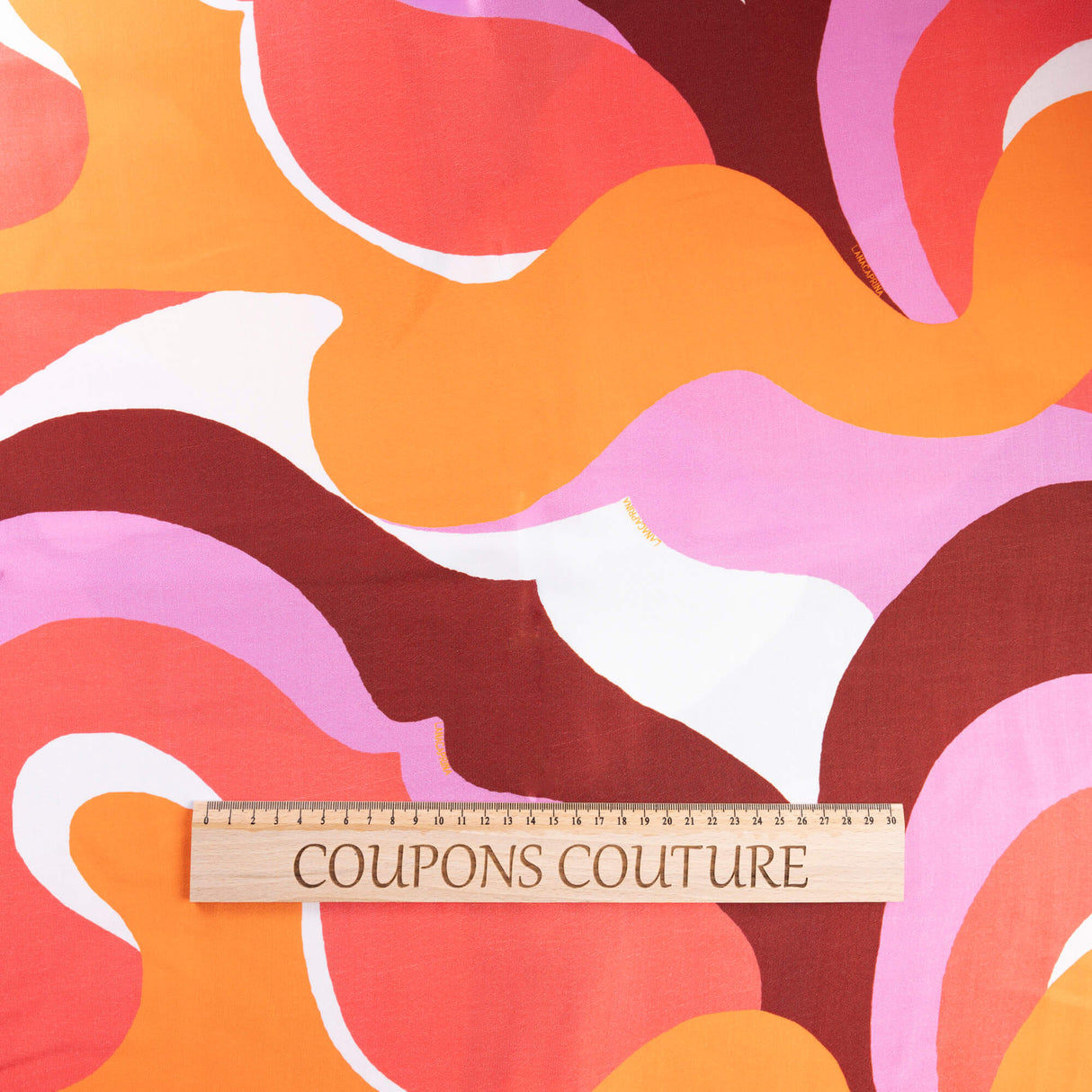 Satin 100% viscose – Motif abstrait corail rose et orange