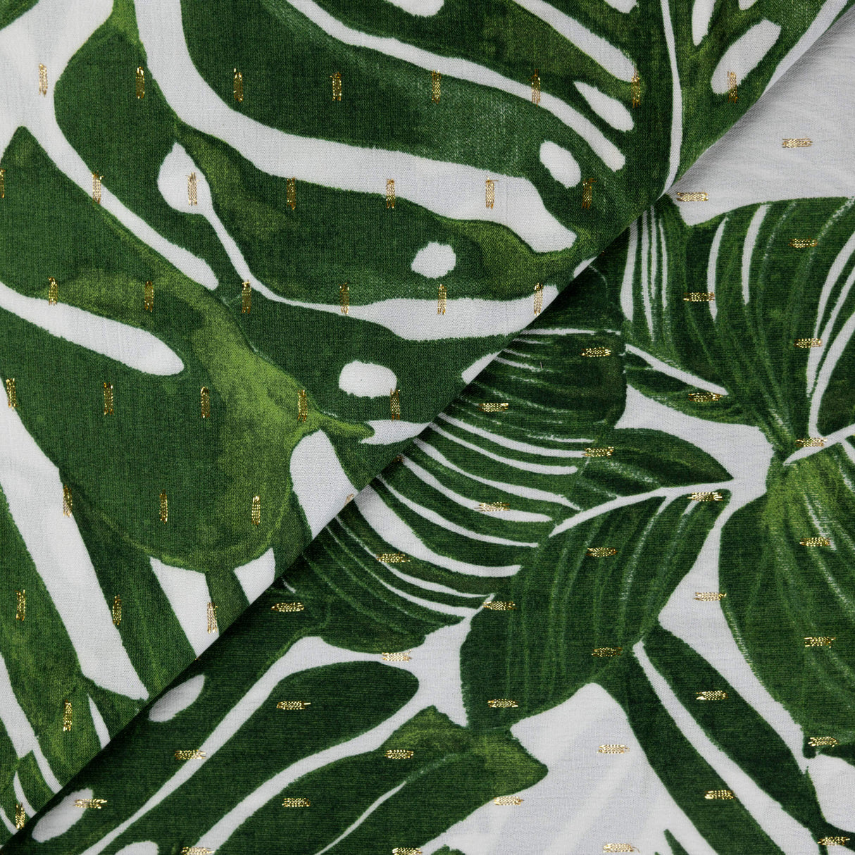 Étoffe 100% viscose - Feuillage tropical vert et lurex doré
