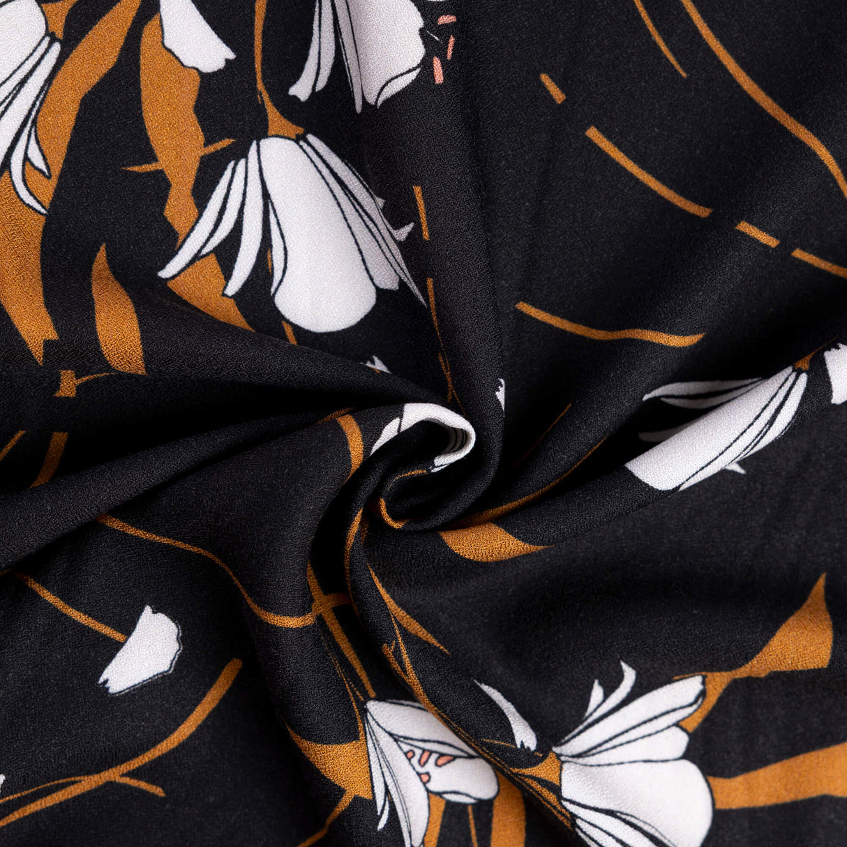 Crêpe 100% viscose - Fleurs blanches et camel fond noir