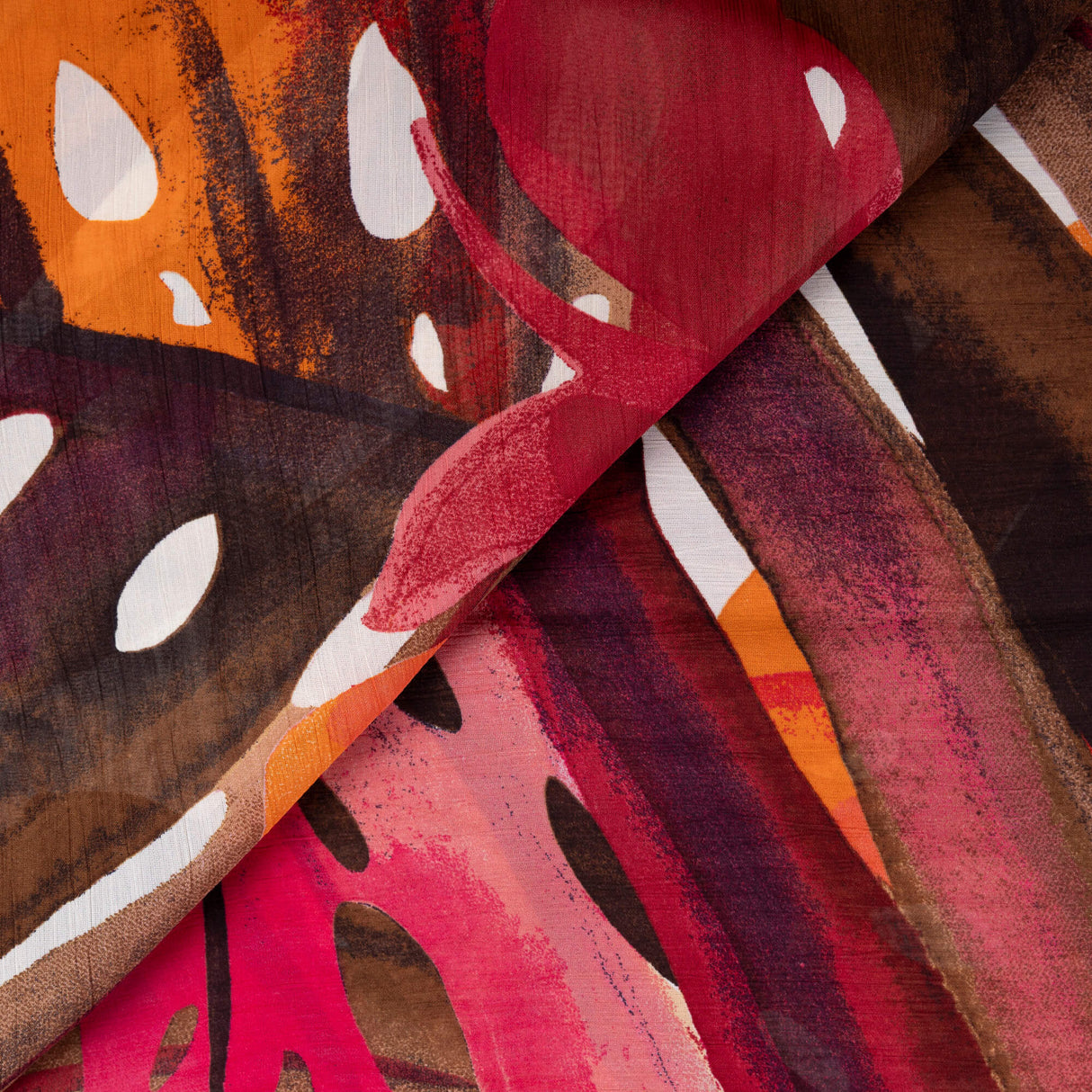 Mousseline 100% viscose - Feuillage tropical corail