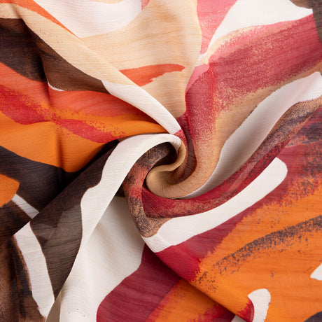 Mousseline 100% viscose - Feuillage tropical corail