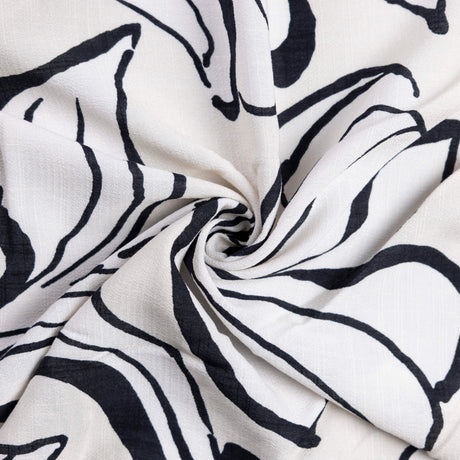 Étoffe 100% viscose - Fleurs graphiques noir & blanc