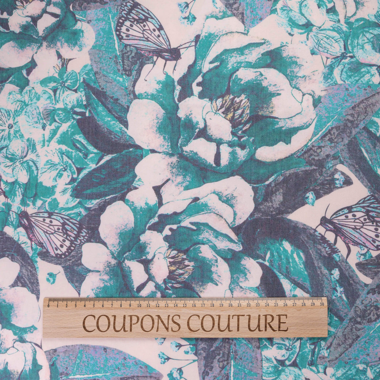 Gabardine de laine extensible - Fleurs et papillons turquoise