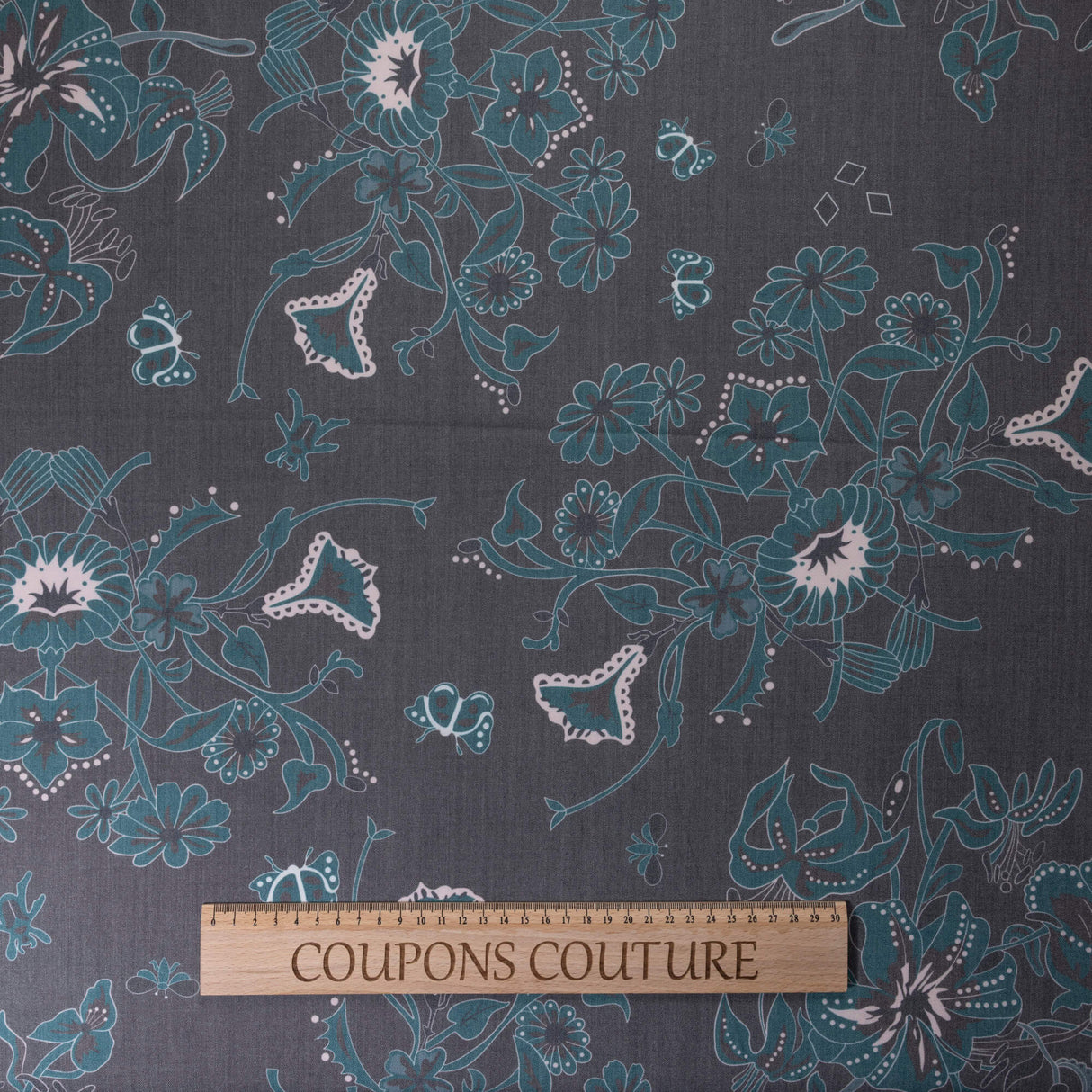 Gabardine de laine extensible - Fleurs et papillons bleu canard