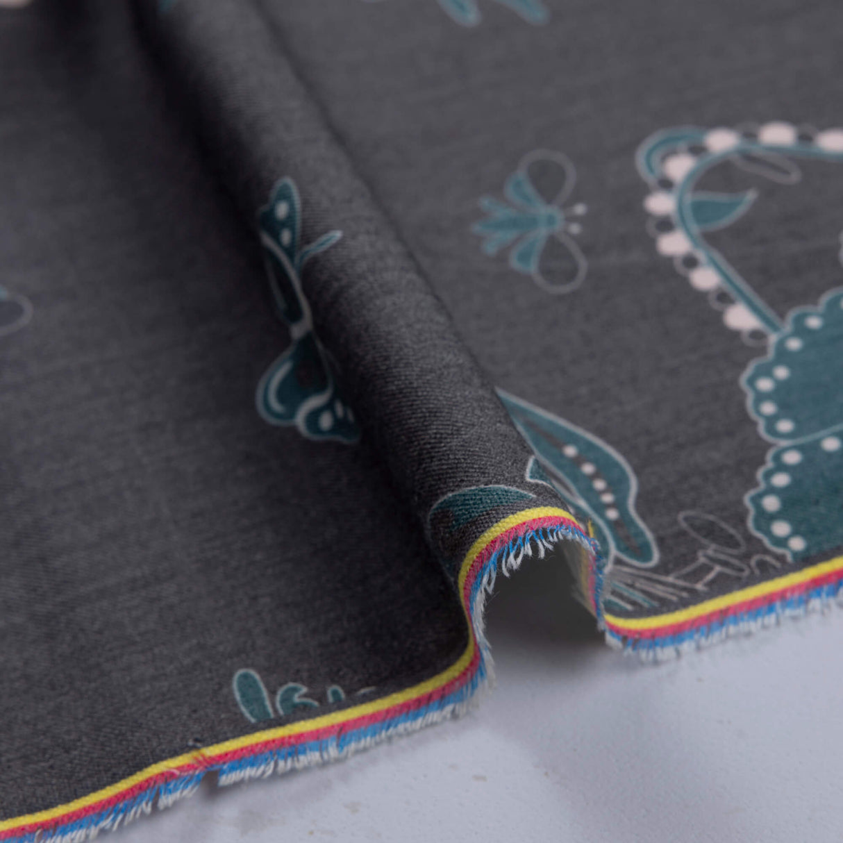 Gabardine de laine extensible - Fleurs et papillons bleu canard
