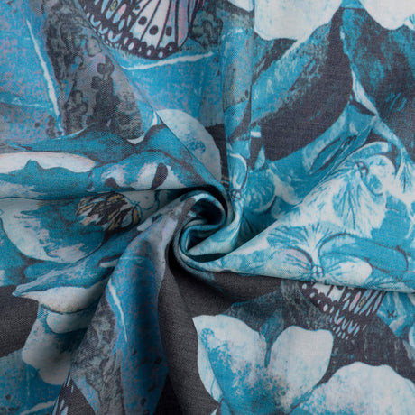 Gabardine de laine extensible - Fleurs et papillons bleu turquoise