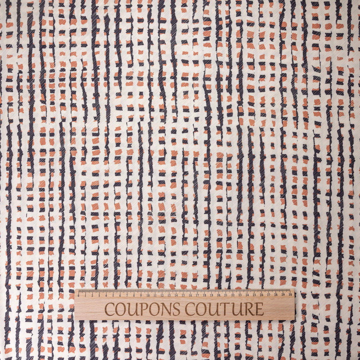 Crêpe microfibre - Graphisme noir et terracotta fond écru