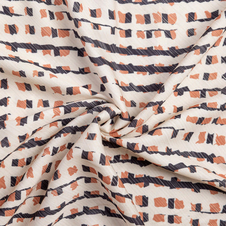 Crêpe microfibre - Graphisme noir et terracotta fond écru